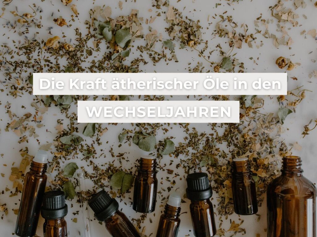 kleine braune liegende Ölflaschen mit getrockneten Kräutern