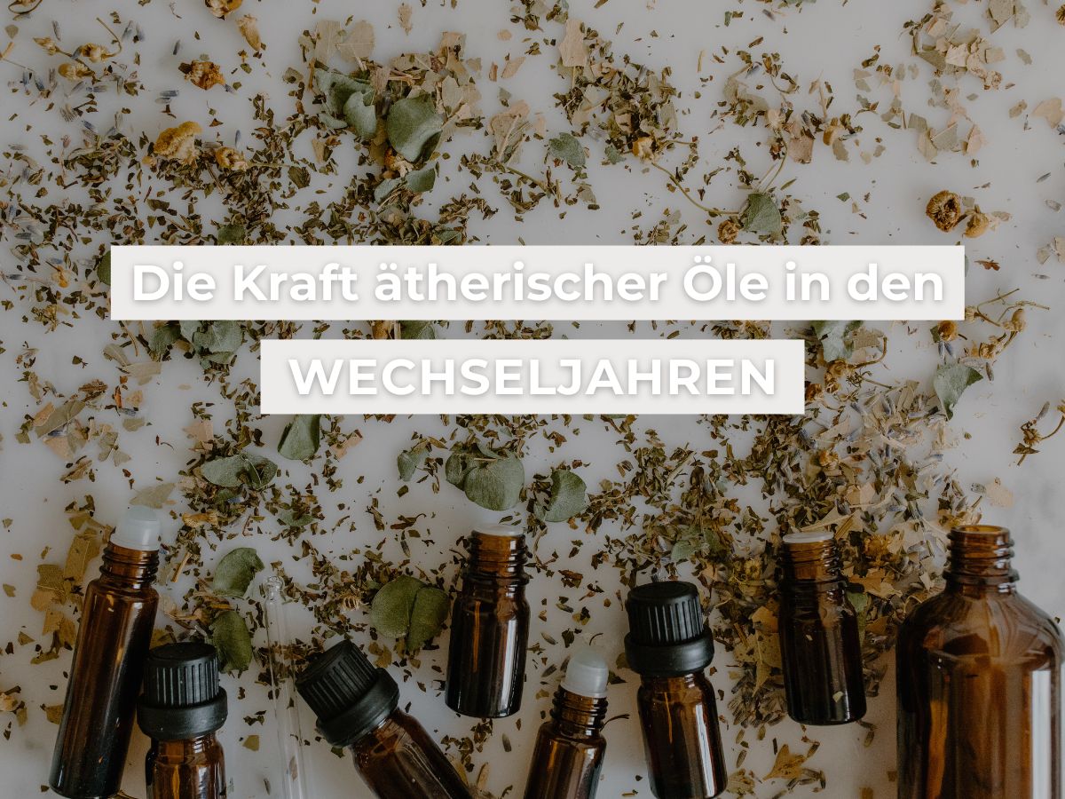 kleine braune liegende Ölflaschen mit getrockneten Kräutern